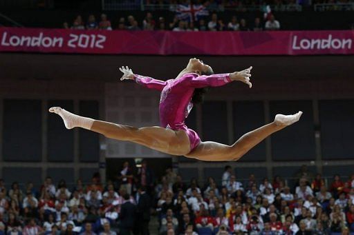 US gymnast Gabrielle Douglas performs on the beam